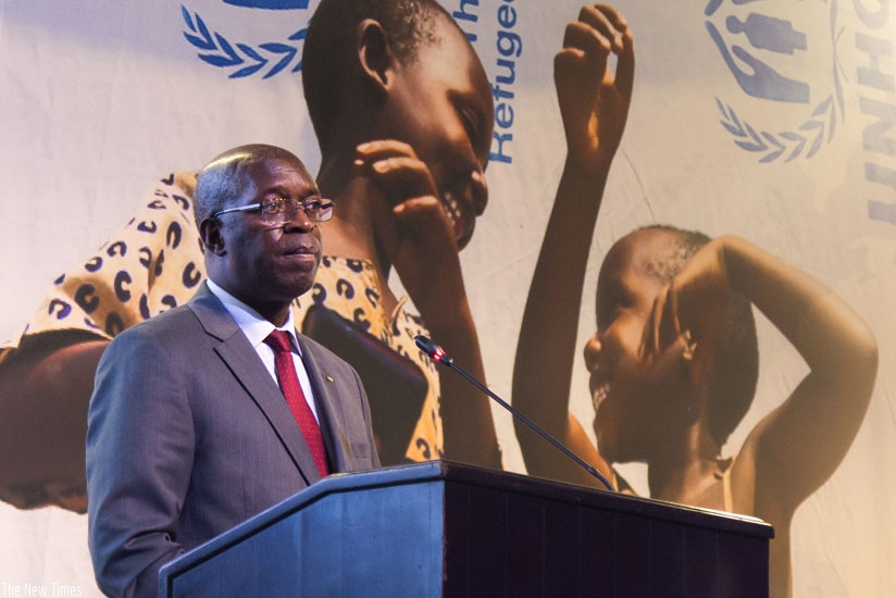 Prime Minister Anastase Murekezi gives his remarks during the World Refugee Day celebrations in Kigali on Monday. (Timothy Kisambira)