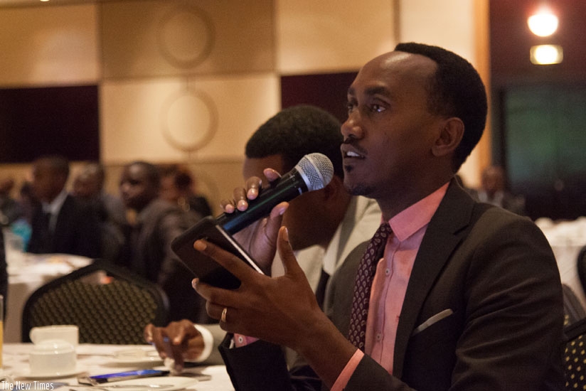 A participant speaks at the EY function on Tuesday. (Nadege Imbabazi)