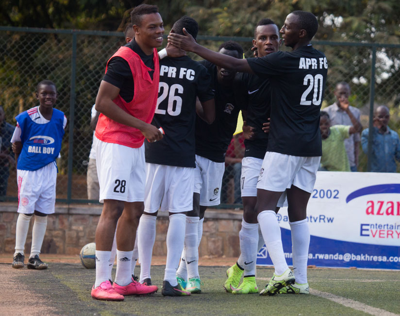APR players celebrate their second goal at Kicukiro turf yesterday. (T.Kisambira)