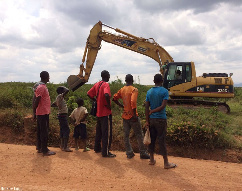 A grader clears the ground on which the countryu2019s first-ever international cricket stadium will be constructed in Gahanga, Kicukiro District. (P. Kabeera)