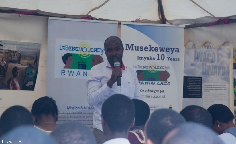 Francois Ruharamirindi , the headteacher of Groupe Scolaire Cyabagarura in Musanze District, speaks to the youth at the  exhibition in Kigali, yesterday. (Nadege Imbabazi)