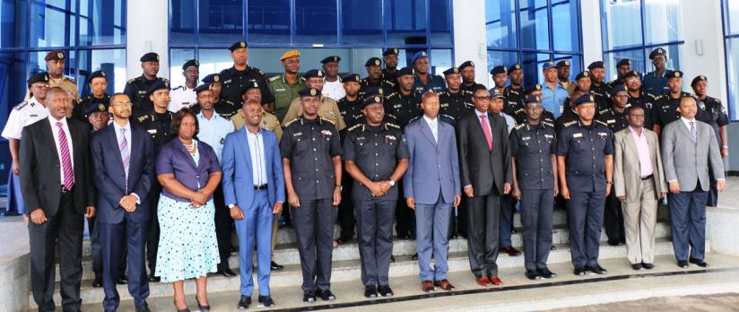 Officials and participants pose for a group photo after the symposium in Kigali yesterday. (Courtesy)