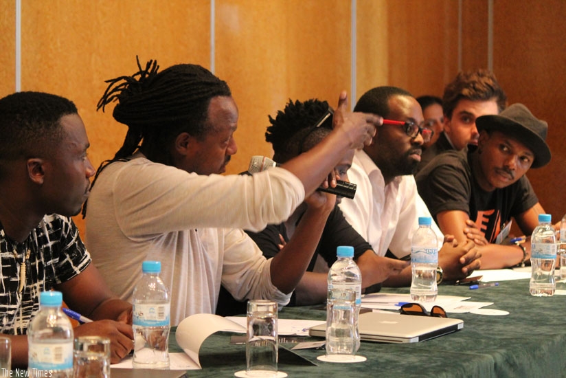 Mighty Popo contributes to the discussions at the forum last weekend. (Moses Opobo)