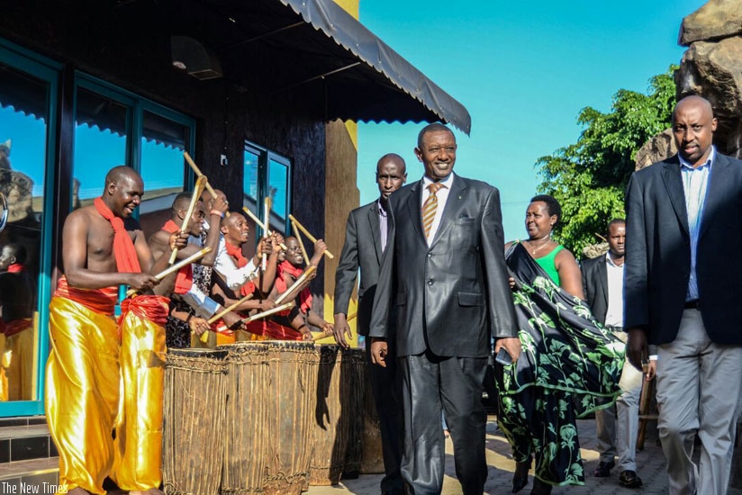 Rwanda's High Commissioner to Uganda Frank Mugambage arrives at the event at Moto Moto Lounge in Ggaba. (Courtesy)