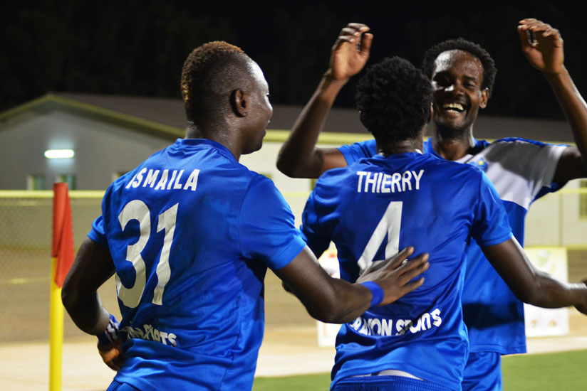 L-R; Rayon Sports goalscorers, Diarra, Manzi and Kasirye celebrate the later's goal against Amagaju FC in the 4-1 win on Saturday. (S. Ngendahimana)