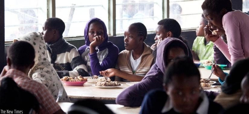 Students enjoy their lunch during a civic education training programme in 2009. (File)