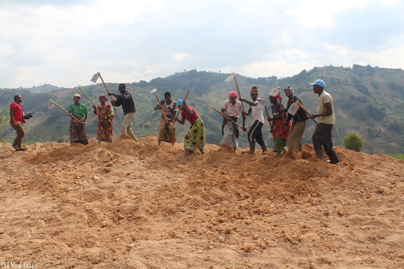 Ngororero residents prepare the site where some model housing units that are resilient to disasters will be constructed as part of efforts to minimise disasters in the district. (Courtesy)