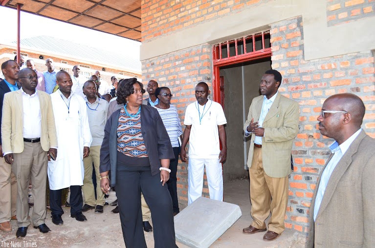Minister Binagwaho talks to hospital staff and district officials during her visit of the new Kizuguro Hospital recently. (Kelly Rwamapera)