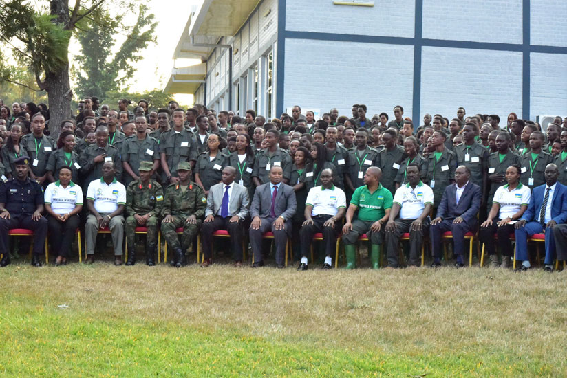 Rwamukwaya (C) in a group photo with other government officials and students after the launch of the civic education at Gabiro Combat Training School. (Nadege Imbabazi)