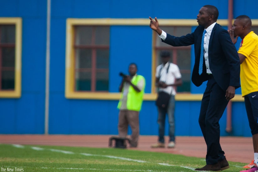 Rayon Sports interim head coach Djuma Masudi gives instructions to his players during Mondayu2019s Peace Cup final against APR FC, which the former won 1-0. (N. Imbabazi)