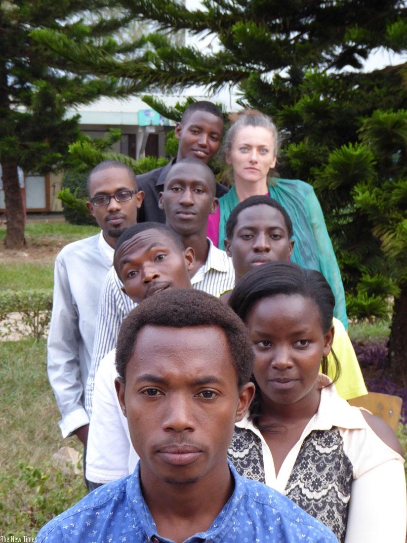 The cast of the poem 'Rubebe', with Bahati Innocent at the back (in black shirt). (Courtesy)