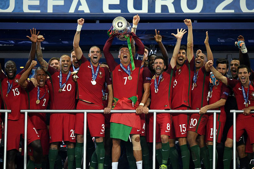 Cristiano Ronaldo holds aloft the Henri Delaunay Trophy after Portugal defeated tournament hosts France to win Euro 2016. (Internet photo)