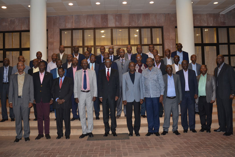 Kabarebe (C ) in a group photo with the retired officers at RDF Senior Officers Mess in Kimihurura on Monday. / Courtesy.