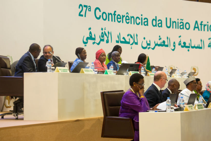 Dr. Nkosazana Dlamini-Zuma, fourth right, together with other AU delegates follow proceedings during the meeting in Kigali. / Timothy Kisambira.