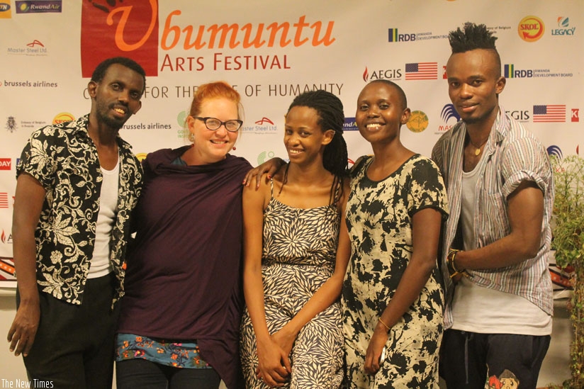 Becky (2nd left) poses for a photo with part of the cast of Africa's Hope in between rehearsals on Tuesday night. They are clad in some of her costumes. (Courtesy)