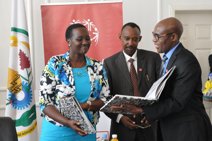 Minister Julienne Uwacu and Nyambe Charles after signing the partnership at the Ministry headquaters in Remera on Saturday. / Courtesy