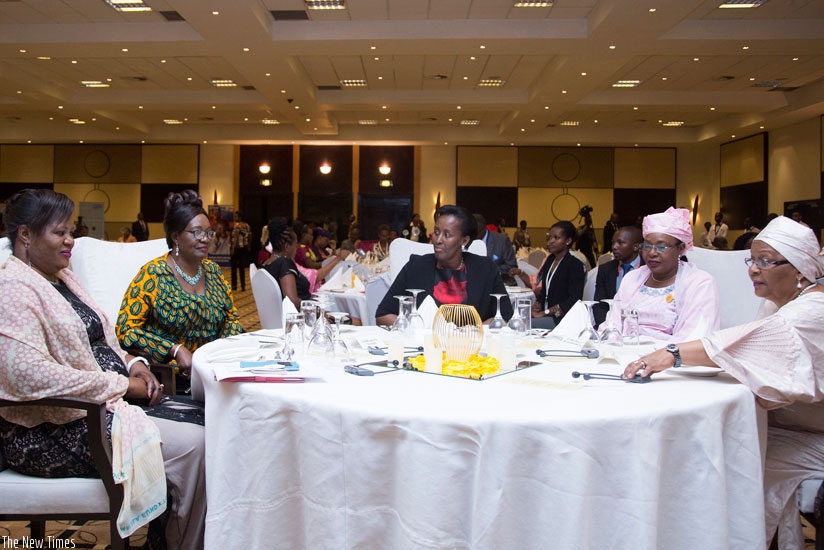 The First Lady, Mrs Jeannette Kagame (centre), and her counterparts from around the African continent and officials from Plan International and Malala Fund at the dinner in Kigali over the weekend. / Courtesy. 