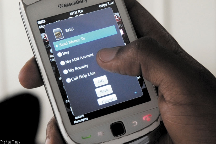 Cross-border mobile money services have eased business transactions and helped deepen use of e-payment systems among the business community. (File)