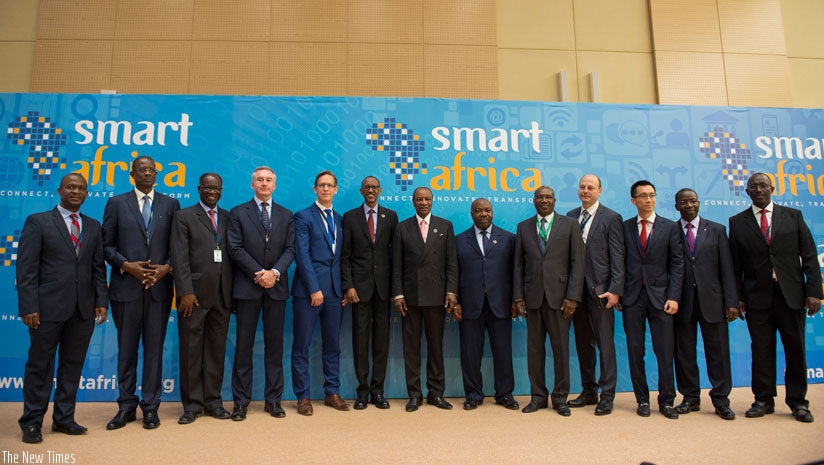 Some of the members of Smart Africa Board after a meeting in Kigali yesterday. President Paul Kagame and his Gabonese counterpart Ali Bongo yesterday launched the One Area Network that will see both countries scrap roaming charges, thus allowing their citizens enjoy reduced call rates. (Photo.Village Urugwiro.)