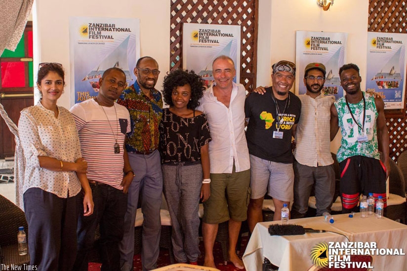 Clementine Dusabejambo, 28, (4th from left) poses for a group photo with other filmmakers.