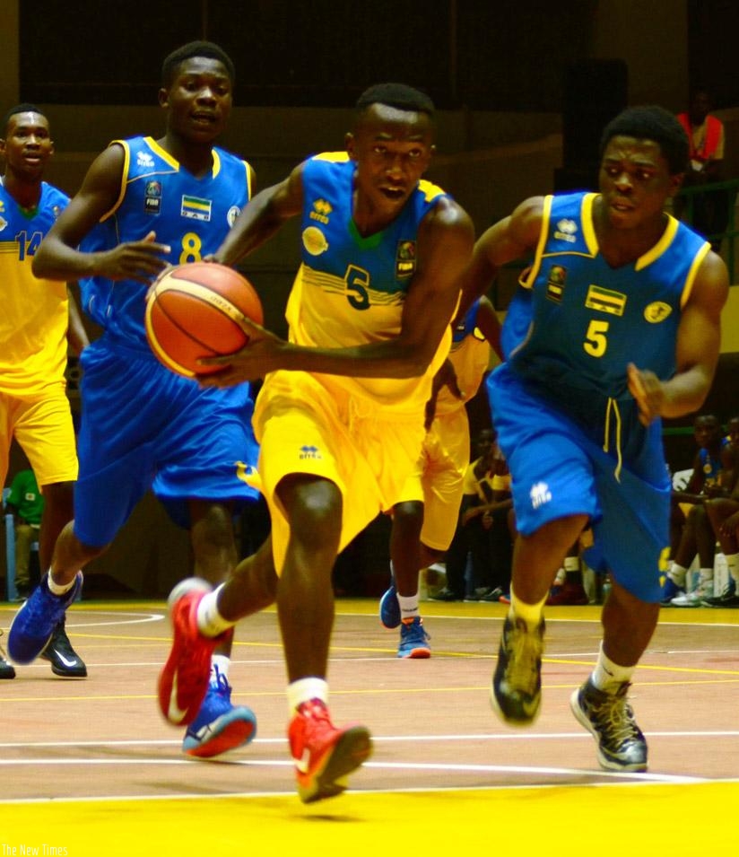 Jean-Jacques Nshobozwabyosenumukiza led Rwandas charge, scoring a game high 22 points in the 94-64 win over Gabon in Group A, yesterday. / Sam Ngendahimana.
