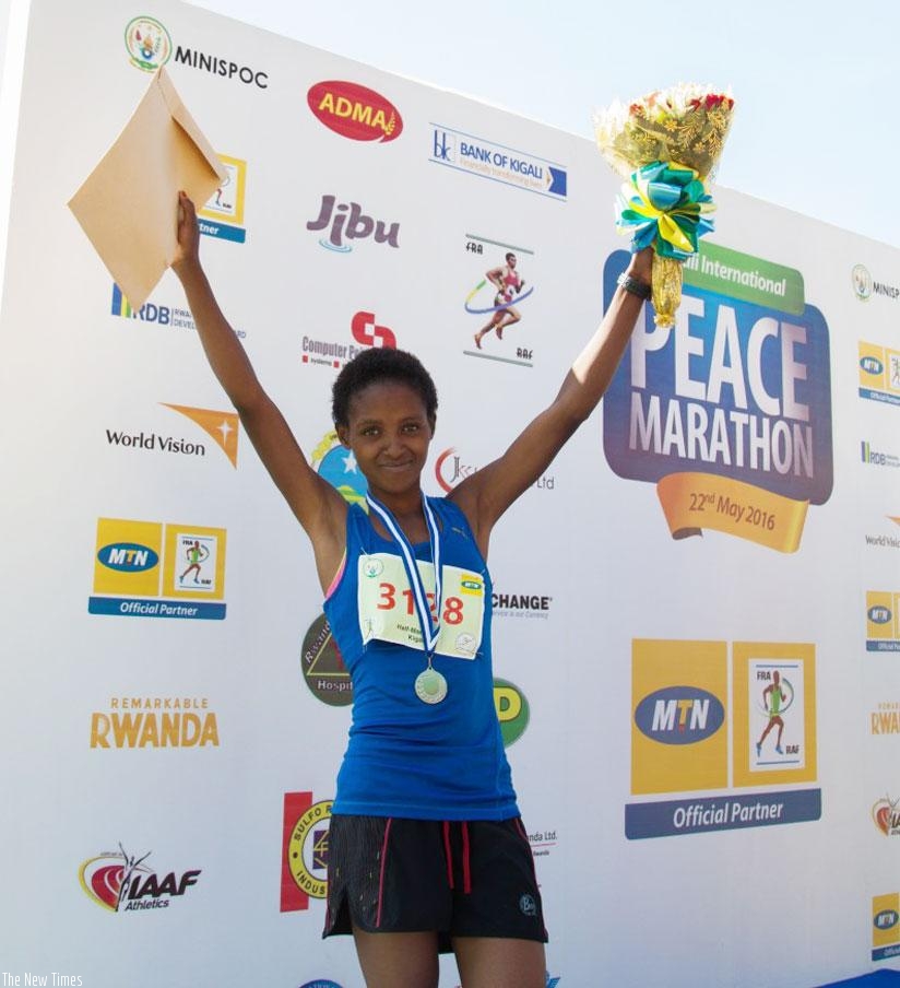 Nyirarukundo celebrates after finishing second in the 2016 Kigali Peace Half Marathon in May. / File.