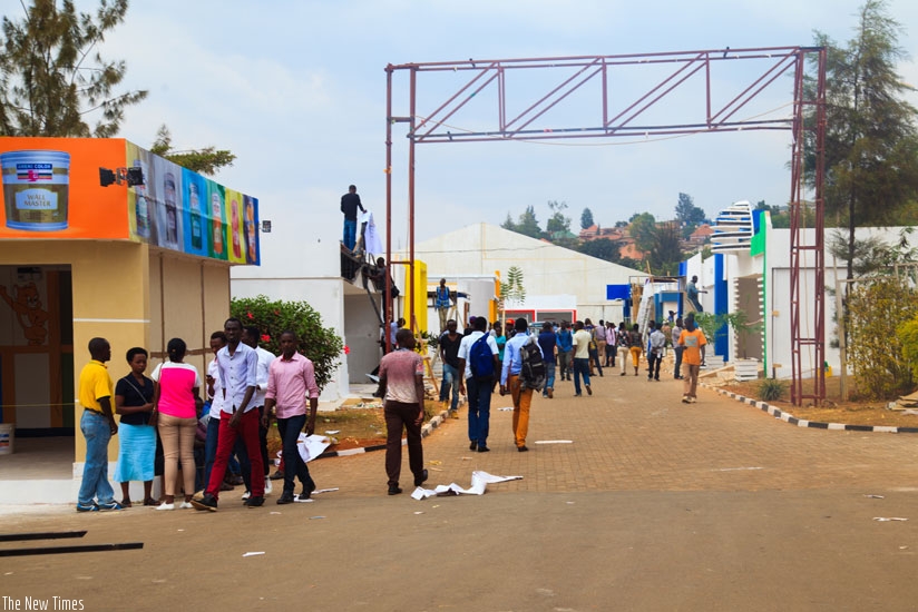 Some of the exhibitors setting up their stalls at the Gikondo Show Grounds yesterday. (Nadage Imbabazi.)