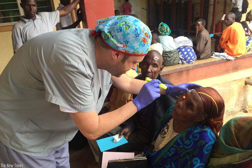 Dr Cobiu00e1n treats a cataract patient in Rwamagana. (Courtesy)