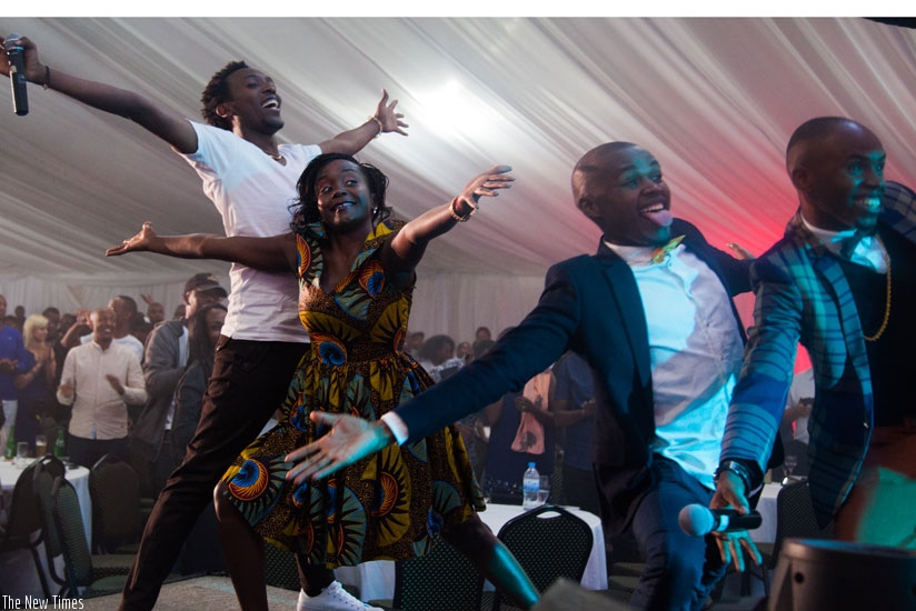The performers take a group selfie after entertaining the crowd. (Nadege Imbabazi)