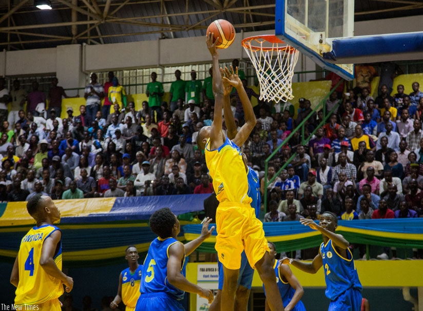Rwanda's Osborn Shema in action against Gabon during 2016 FIBA Africa U-18 Championship Group A game played last week at Amahoro indoor stadium in Kigali. / Faustin Niyigena.