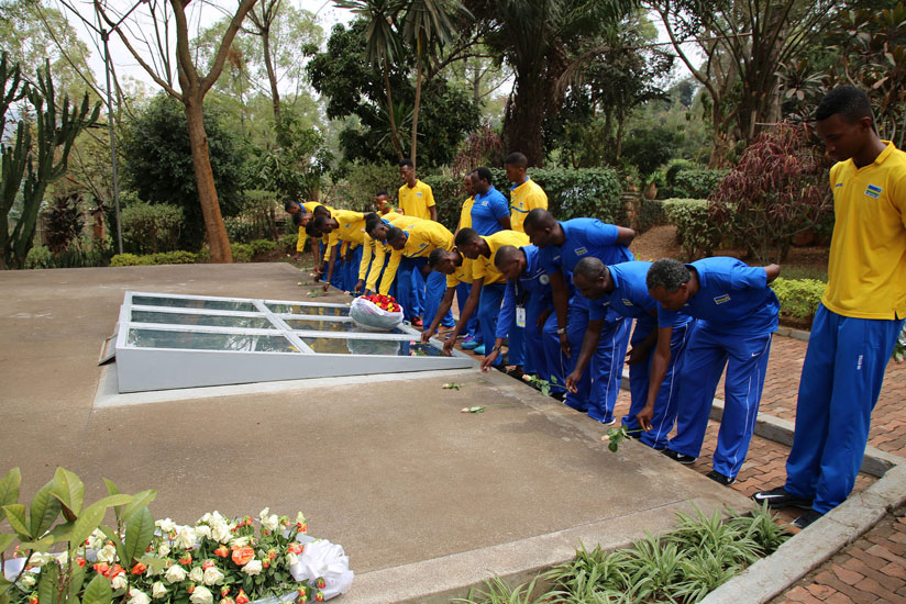 Players from Rwanda, Uganda and Angola pay respect to the victims of the 1994 Genocide against Tutsi at the the Kigali Genocide Memorial Centre. / Courtesy.