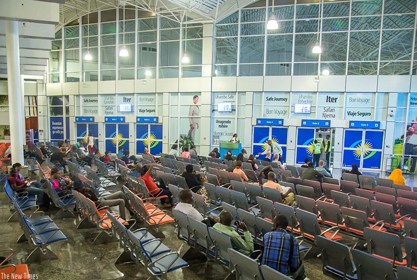 Passengers at Kigali International Airport wait for their flights. / Nadege Imbabazi.