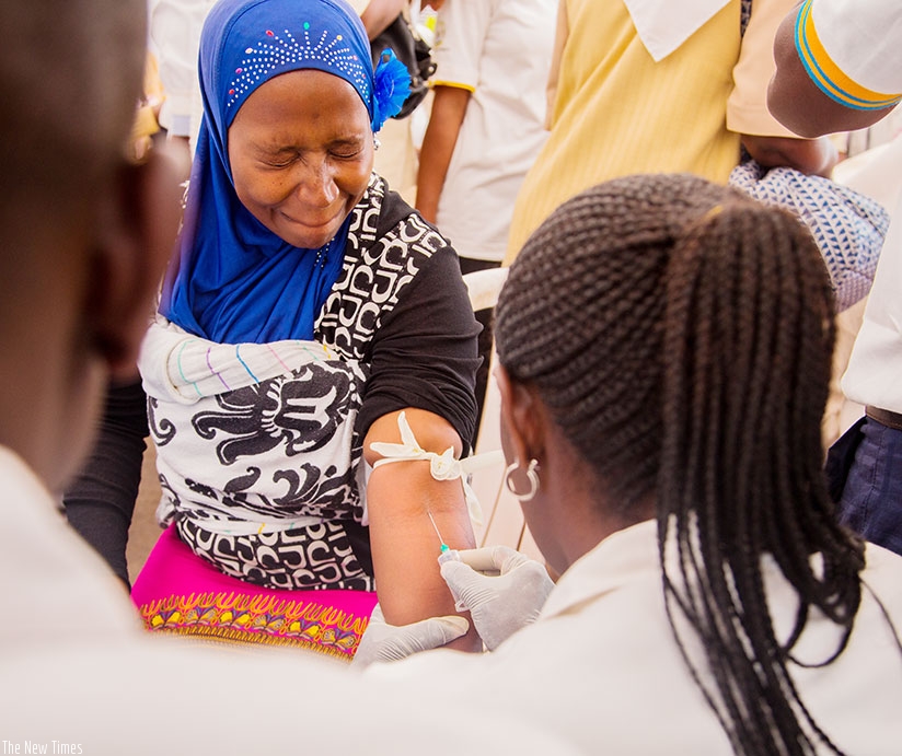 A volunteer takes a blood test for Hepatitis last week at Car-Free Zone in Kigali. / Faustin Niyigena.