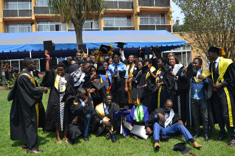 The graduates pose for a group photo at the event held in Kigali yesterday to mark their success. / Lydia Atieno.