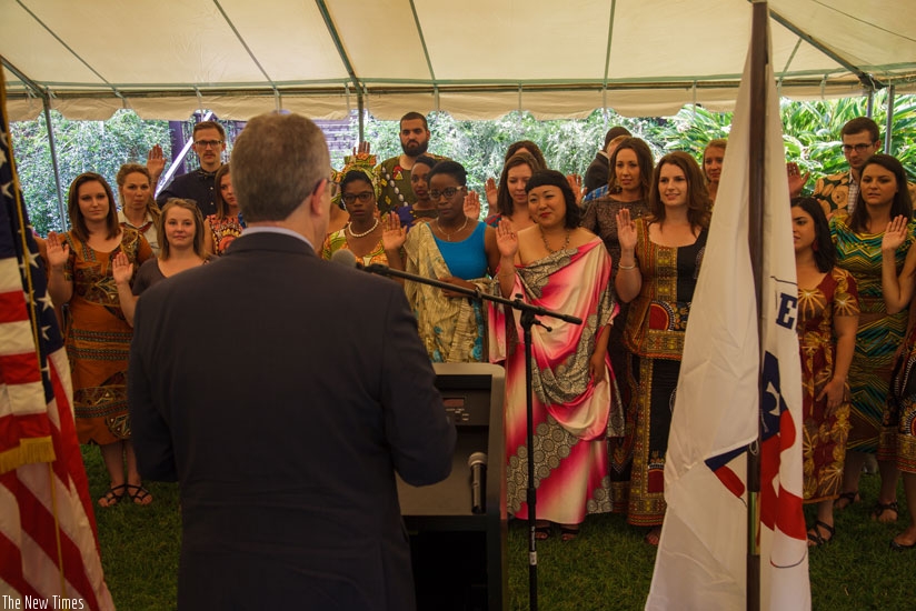 The Peace Corps volunteers take oath of service. / Teddy Kamanzi. 