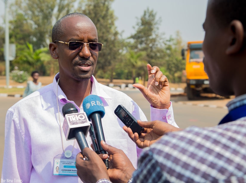 Reuben Ahimbisibwe, the official in charge of infrastructure in the City of Kigali, speaks to the media about the new changes to traffic pattern in the areas around the Kigali Conv....