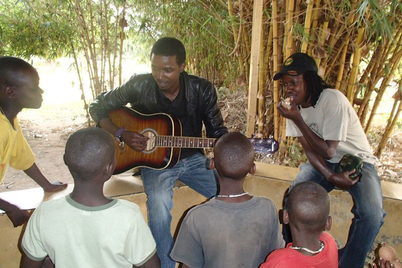 Celestin entertains children. / Courtesy.