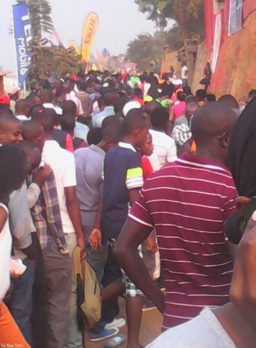 Shoppers wait in lines to enter the trade fair on Saturday. Long and thick lines characterised the three-day long holiday as a large number of showgoers went shopping at the exhibi....