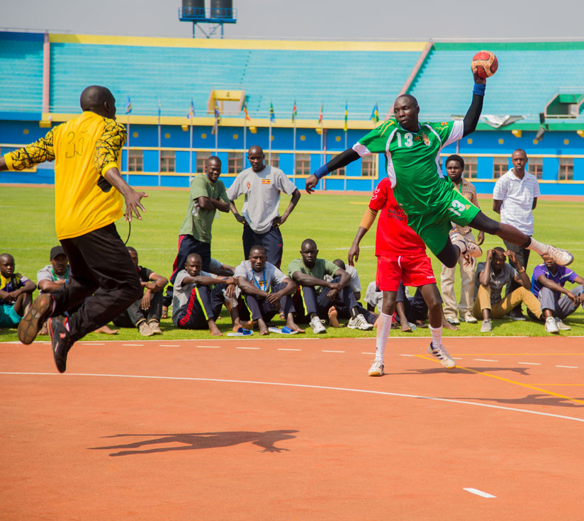 Uganda's Alworunga Chesor scores a goal against Kenya in the handball game at National Amahoro Stadium on Wednesday during the 10th East African Military games. (All photos by Faus....