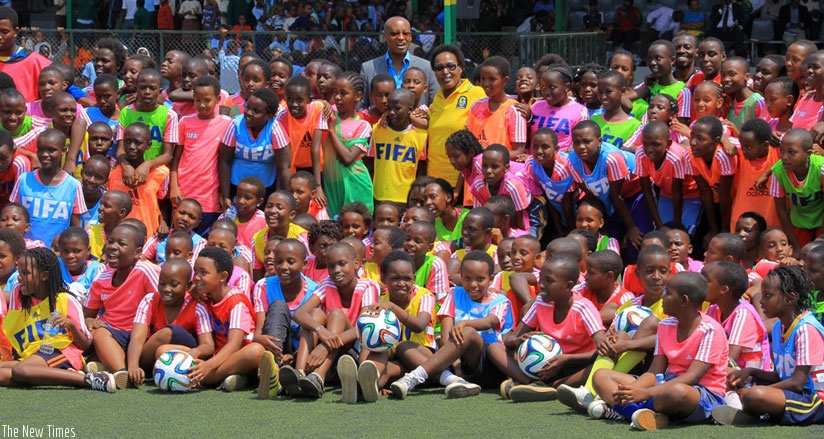 FERWAFA vice president Vedaste Kayiranga and Felicite Rwemalika (standing centre) and some of the participants. (Courtesy)