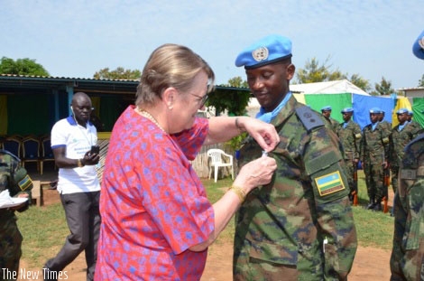 Rwanda Aviation Unit Contingent Commander, Lt Col Niyomugabo being decorated by the Special Representative UN Secretary General in South Sudan.