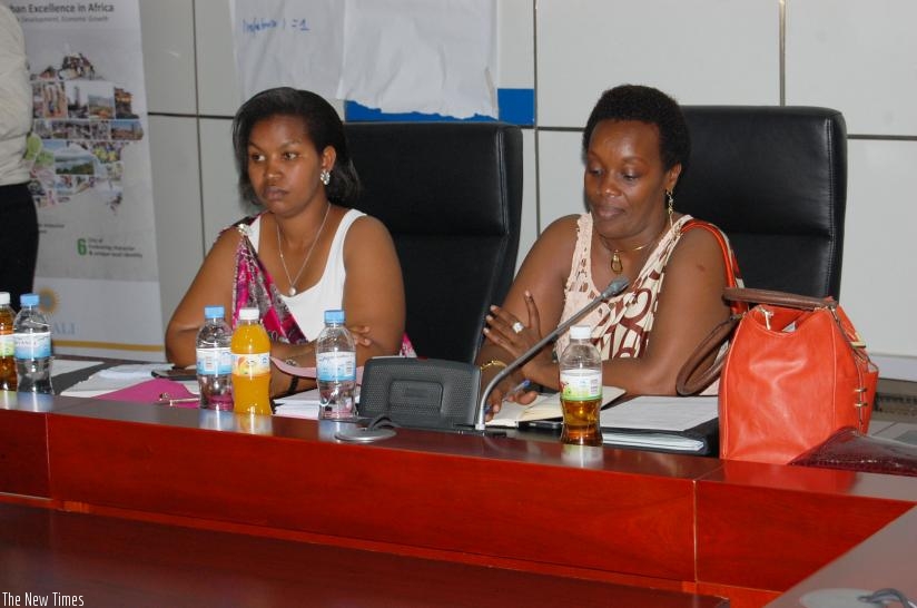 The City of Kigali vice mayor in charge of social affairs, Judith Kazayire (L), and Gender and Family Promotion minister Diane Gashumba during the General Assembly of National Wome....