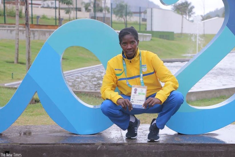Mukasakindi poses for a photo in Rio before the womenu2019s marathon competition on Sunday where she posted her worst time due to an ankle injury. (Courtesy)