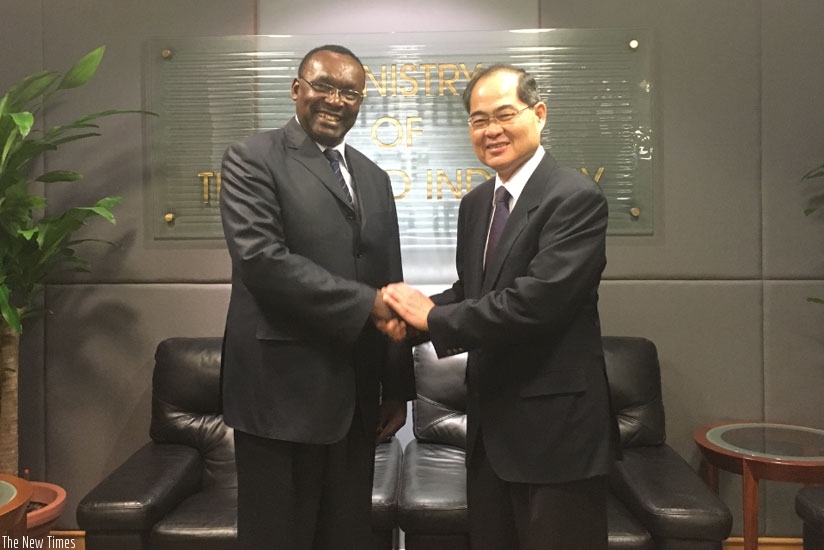 Minister for Trade and Industry Francois Kanimba and his Singapore counterpart  Hon Lim Hng Kiang. / Courtesy.