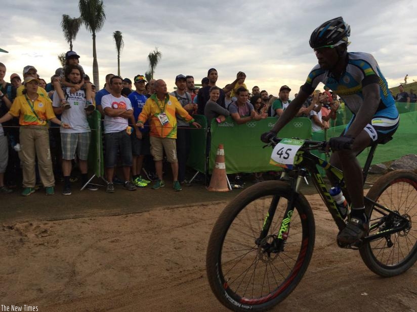 Nathan Byukusenge captured competing in the mountain bike