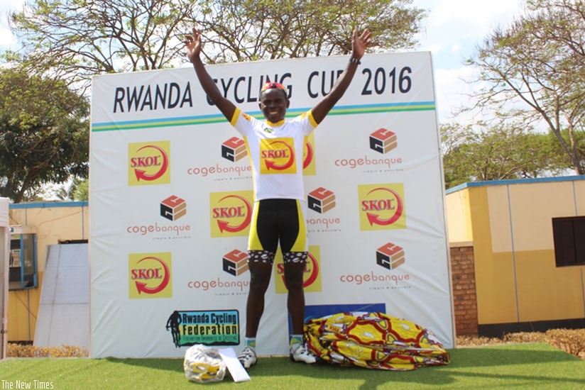Gasore celebrates on the podium after winning the Muhazi Challenge cycling race on Saturday. (Courtesy)