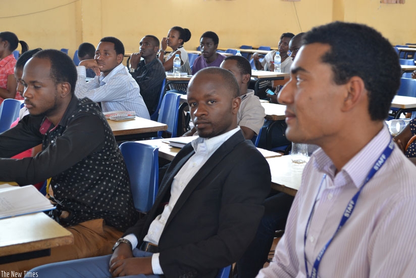 University students in a lecture. Many students at this level work and study. / Lydia Atieno.