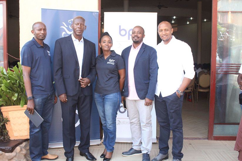 Ntidendereza (second left) and Muhongerwa (middle) with other BPR employees at the training. (Photos by Donata Kiiza)