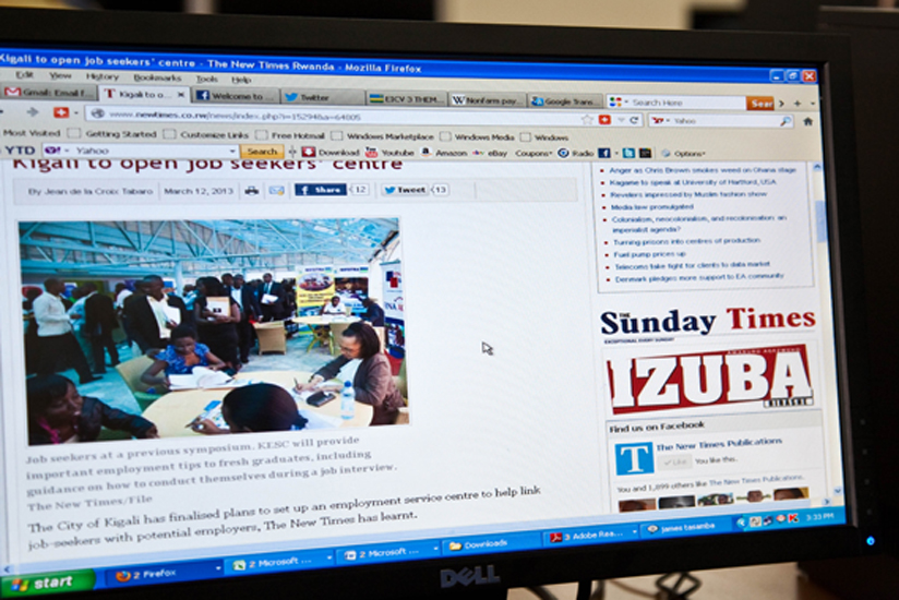 An Internet user surfs The New Times web site. Internet end-users pay more owing to costs of web-hosting in Western countries. (File)