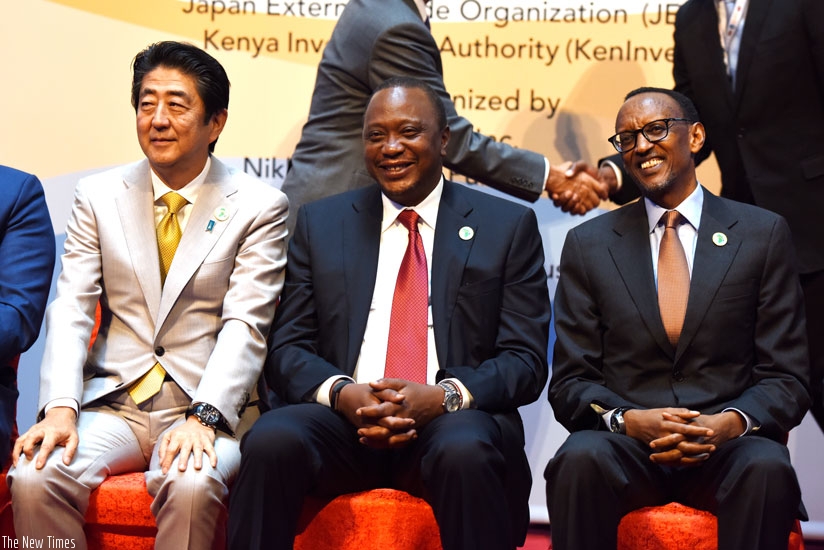 From L-R; Japanese Prime Minister Shinzo Abe, Kenyan President Uhuru Kenyatta and President Kagame at the 6th Tokyo International Conference on African Development in Nairobi, Keny....